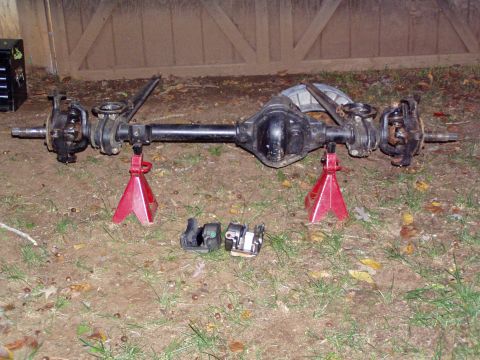 1989 Ford F-250 - Rear axle assembly from a Ford F-250, removed and supported by jack stands.