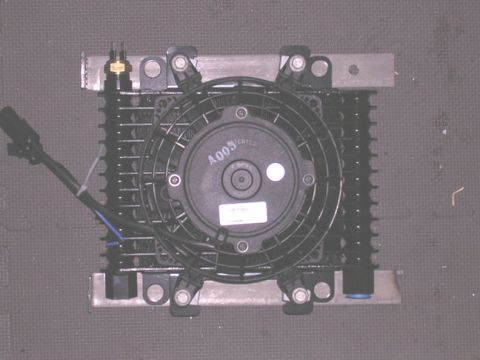 1994 Ford Bronco - cooler put on brackets. its a b&m with a puller fan. Expensive sucker. better fix my tranny overheating.