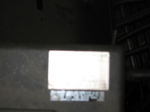 1991 Ford LTD Crown Victoria - Label on a black box, possibly a part number or identification tag.