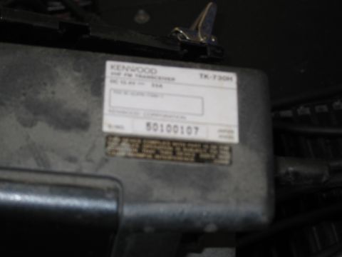 1991 Ford LTD Crown Victoria - A close-up view of a Kenwood TK-730H FM Transceiver, showing its model and serial number.