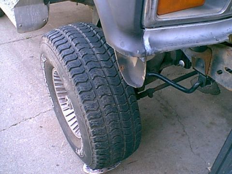 1983 Ford Bronco - this is the pass side with the fender cut out but not the plastic liner. This is a good place to catch crud and start rusting the beast out.