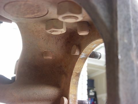 1987 Ford Bronco - shot of the underside of the knuckle, i think all 4 bolts are threaded and the 2 nuts are used as jam nuts