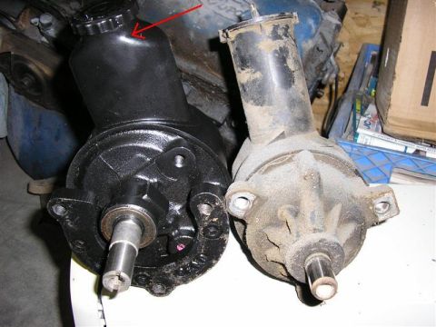 1979 Ford Bronco - Comparison of a new black power steering pump with an older, used one.