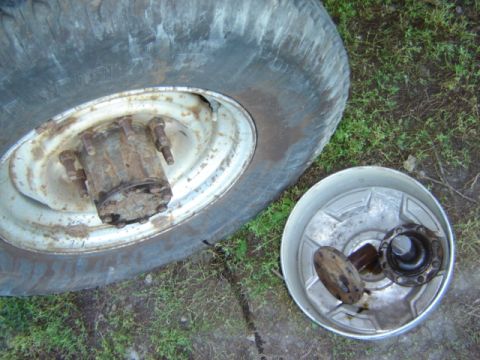 1992 Ford Bronco - Disassembled wheel hub and brake drum assembly, likely for repair or maintenance.