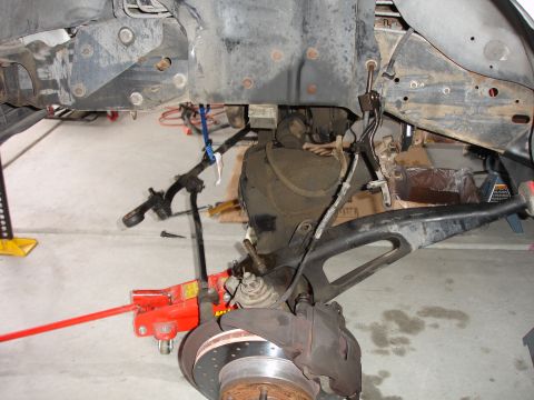 1996 Ford Bronco - Front suspension and brake assembly, likely during a repair or modification process.