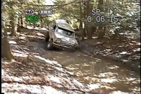 1989 Ford Bronco - This 1989 Ford Bronco tackles a challenging muddy off-road course.