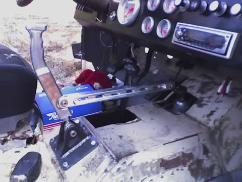 1971 Ford Bronco - Interior view of a modified vehicle, showing a custom shifter and dashboard instrumentation.