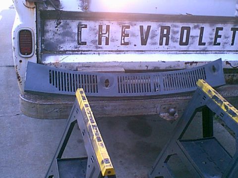 1983 Ford Bronco - with a few screws and removing the washer hose the old cowl was off.