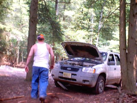 2001 Ford Escape - xx_bill and my Escape, Houdini, cooling off the clutch. I hate that smell.