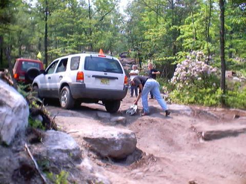 2001 Ford Escape - And he did it!! Houdini made it out alive!! But there's problem...oh no! The hubcap has been crushed!