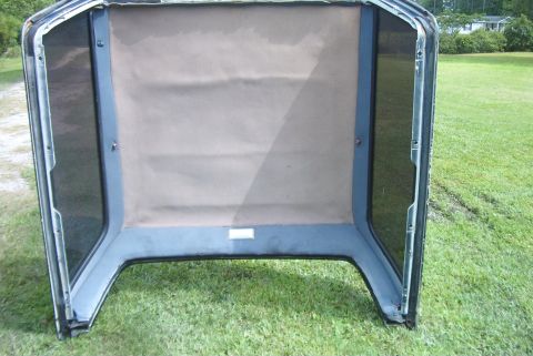 1988 Ford E250 - This is a van top with a tan headliner and dark tinted windows. The registry label may be incorrect.