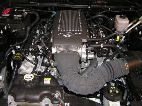 2007 Ford Mustang - Notice the pony emblem on the top of the engine. This was part of the optional package that also included the hood scoop (non-functional) a…