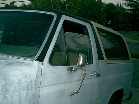 1983 Ford Bronco - it was time for the worn hotrod grey primer to be covered. i like the blacked out look so i got flat black for now. here was the top and si…