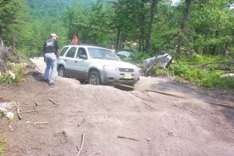 2001 Ford Escape - OK, who took this behind the scenes photo. Now you know how Houdini made it up one of the rocks. This was the only time a strap was used on…
