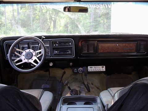 1978 Ford Bronco - Interior view of a 1978 Ford Bronco, aftermarket steering wheel and CB radio.