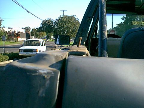 1983 Ford Bronco - this was the broken driverside bolt. i had to cut it off and gring it flat. i then drilled and tapped a new hole.