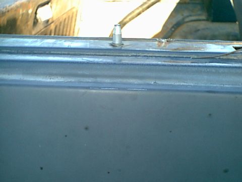 1983 Ford Bronco - here the oin is in the hole. all this pin does is align the top so it does no slide off the truck.