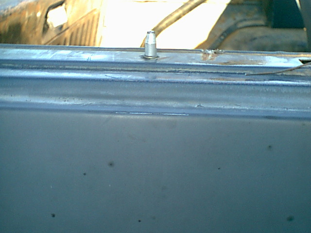 here the oin is in the hole. all this pin does is align the top so it does no slide off the truck.