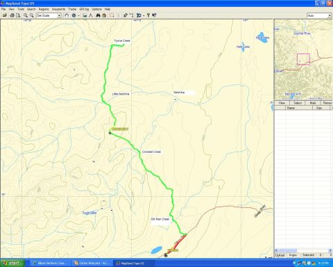 2003 Jeep TJ - A topographic map displays a marked route, with various geographical features and place names visible.