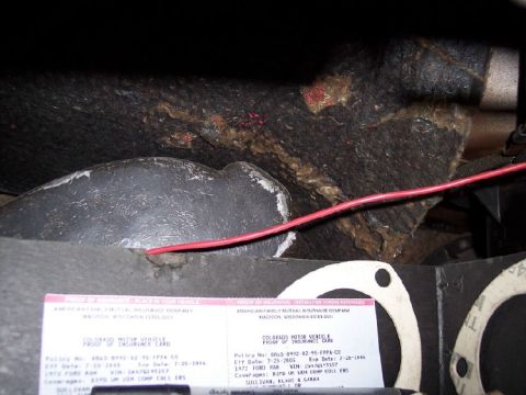1972 Ford Ranchero - Insurance documents for a 1972 Ford Ranchero are visible inside the vehicle, alongside exposed wiring.