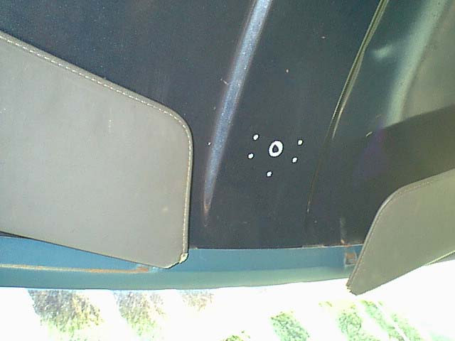 I decided to add the light controller to the front roof. this is an easy to reach place and out of the way. I marked the mount holes and drilled for rivets and a wire feed hole.