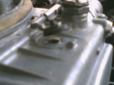 1972 Ford Ranchero - Detail of an engine part, possibly from a vehicle, showing mechanical components.
