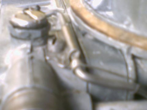 1972 Ford Ranchero - A detailed view of an engine part, possibly from a vehicle, with visible text at the bottom right.