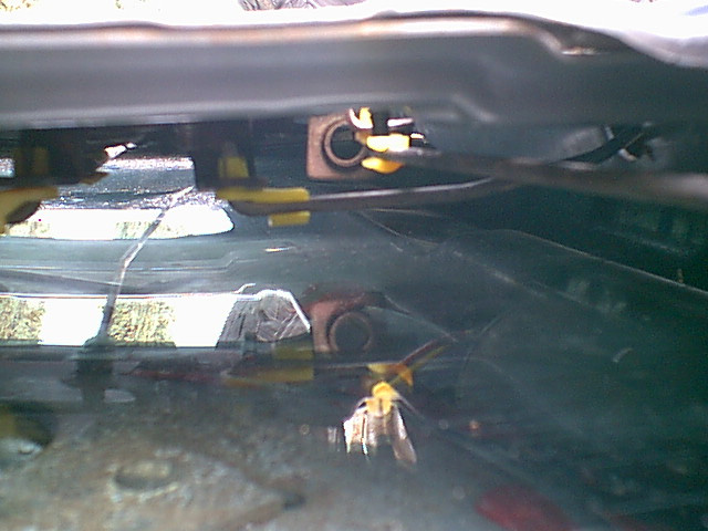 this is a shot from drivers side access hole. you can see the handle rod (coming from the right to the center)
