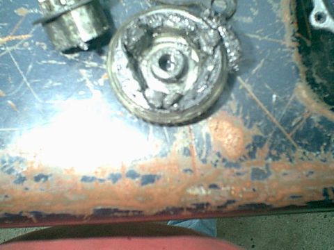 1983 Ford Bronco - Here is a closeup of the bad parts. in the points of the triangle there should be 3 round pins. this help cousion the window from motor sho…