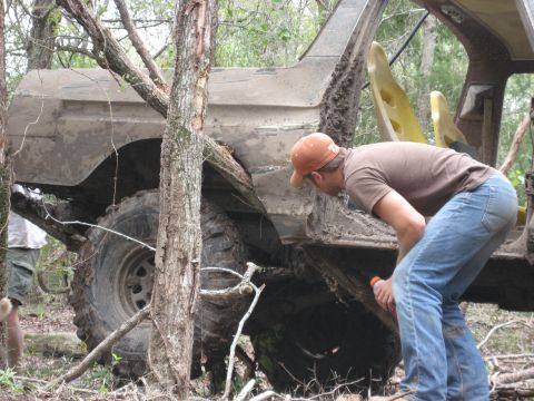 1986 Ford Bronco - uuuuuhhhhh, i think there's a tree under there. and matt (pictured) said he was going to be a good co pilot ha ha