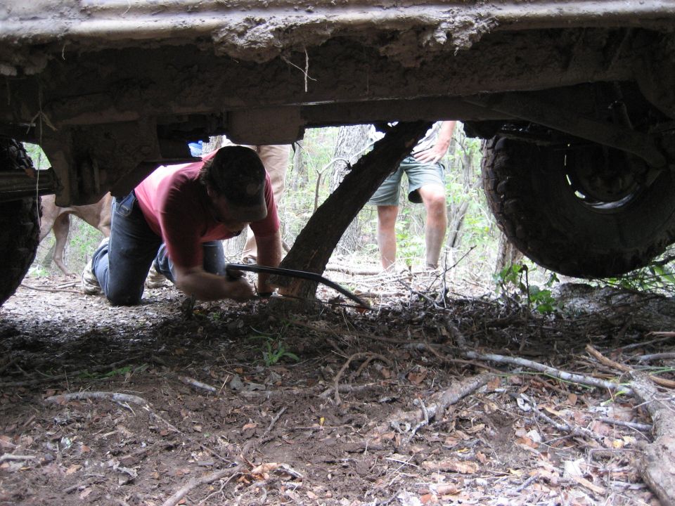 hacking the tree under Franks bronco down