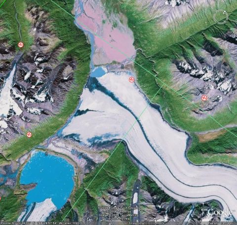 2003 Jeep TJ - Aerial perspective of a glacial landscape, showing ice formations, meltwater lakes, and mountainous terrain.