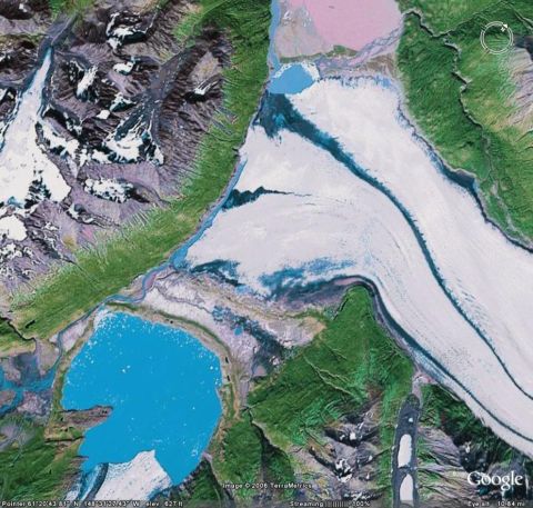 2003 Jeep TJ - Satellite image shows a vast glacial landscape with a bright blue lake and snow-capped mountains.