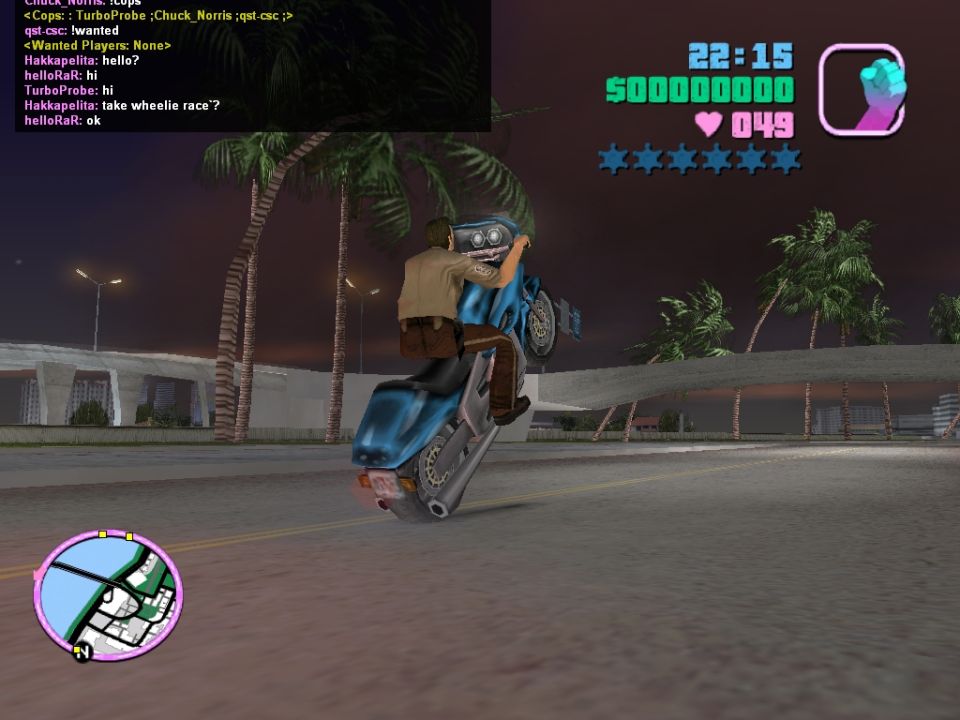 Video game screenshot showing a character on a motorcycle doing a wheelie, with game interface elements visible