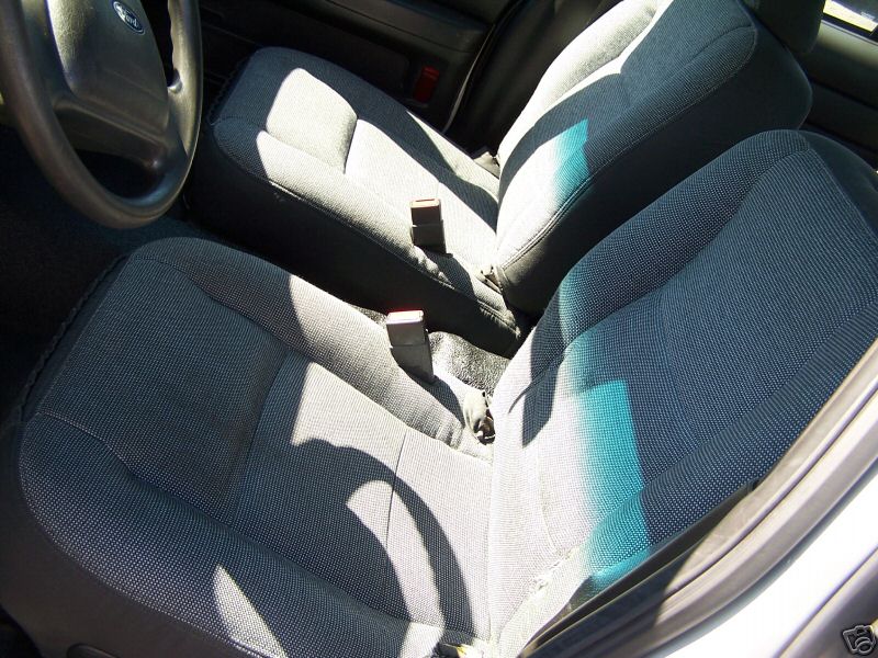 Interior view of 2003 Ford Crown Victoria showing front seats and steering wheel