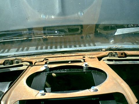 1983 Ford Bronco - the dash was beat up bad in this bronco. i added a few nuts as spacers and used the factory speaker mount holes to install the mount.