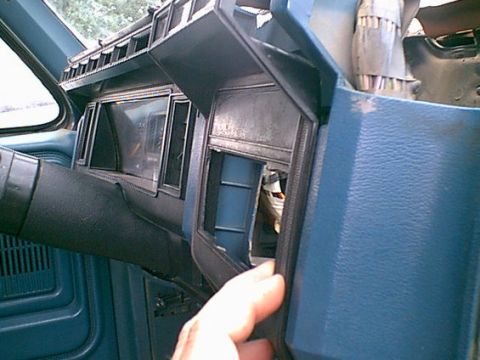 1983 Ford Bronco - you can see all the unused space behind the bezel. all this is is a second harness cover. you can see the bundle in the upper right.