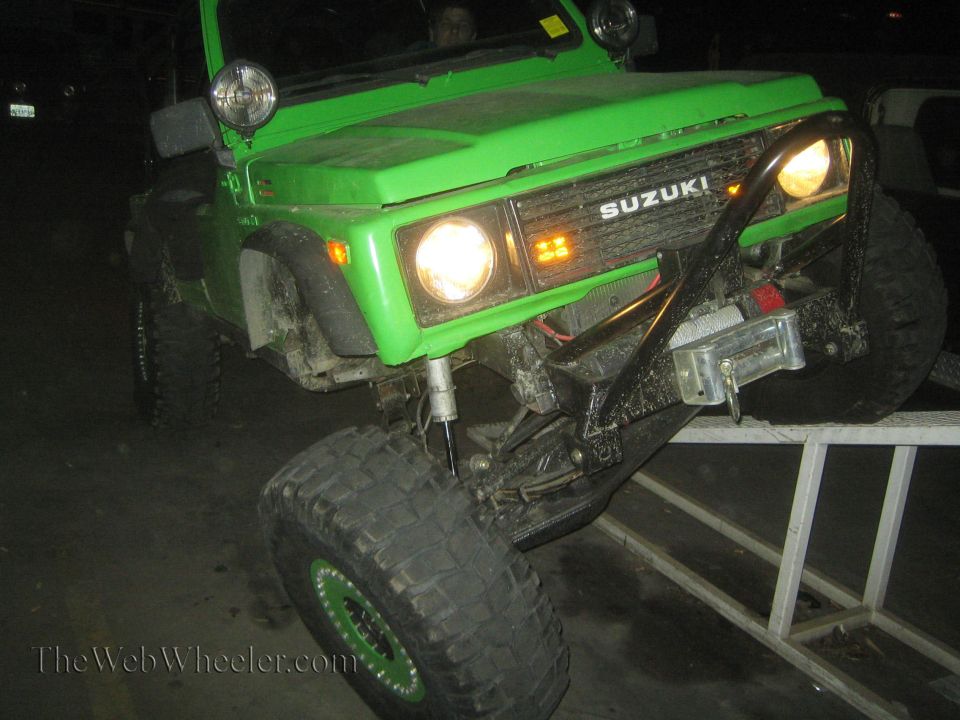 Green Suzuki Samurai with winch on RTI ramp