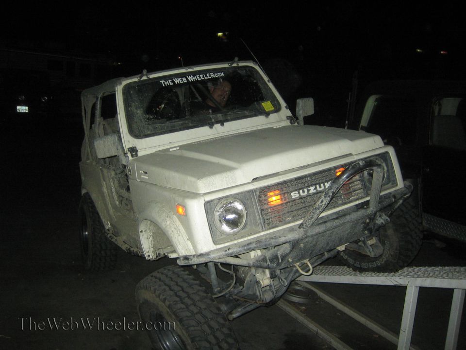 White 1987 Suzuki Samurai on RTI ramp, front grille visible