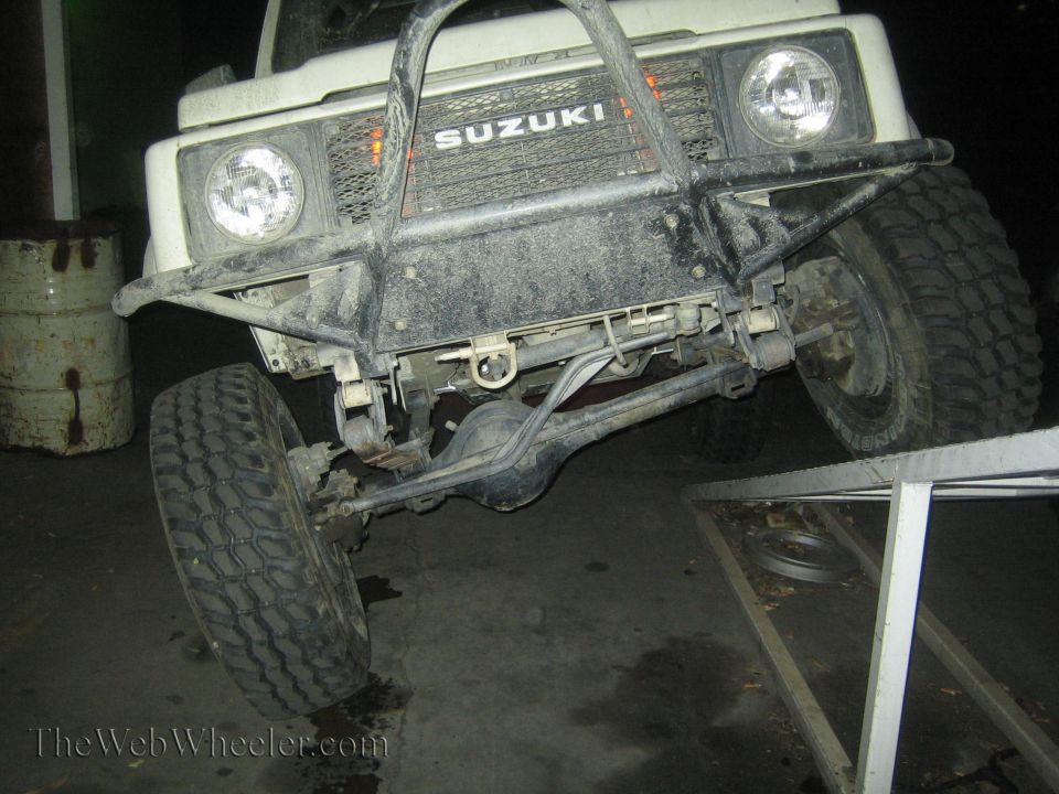 White 1987 Suzuki Samurai front view on RTI ramp