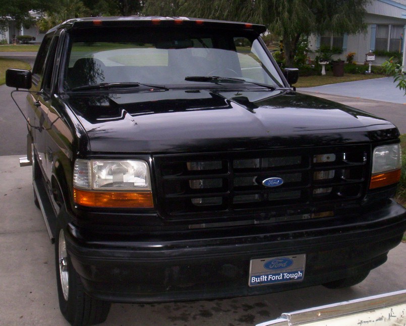 Black 1992 Ford Bronco front view with 'Built Ford Tough' plate