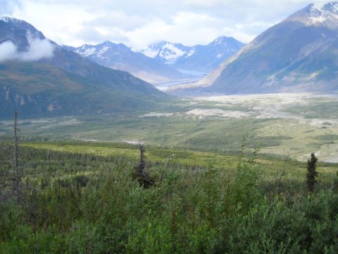2003 Jeep TJ - Expansive view of a glacial valley with snow-capped mountains in the distance.