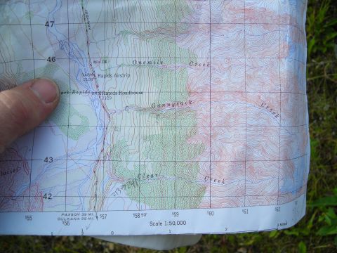 2003 Jeep TJ - A topographic map displays geographical features including creeks and an airstrip.