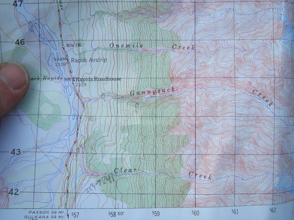 Printed topographic map showing Onemile Creek and Rapids Roadhouse