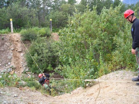 2003 Jeep TJ - Rappelling exercise in progress with safety ropes and personnel.