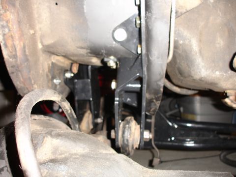 1996 Ford Bronco - This photo shows a close-up view of a vehicle's suspension system, focusing on a newly installed bracket.