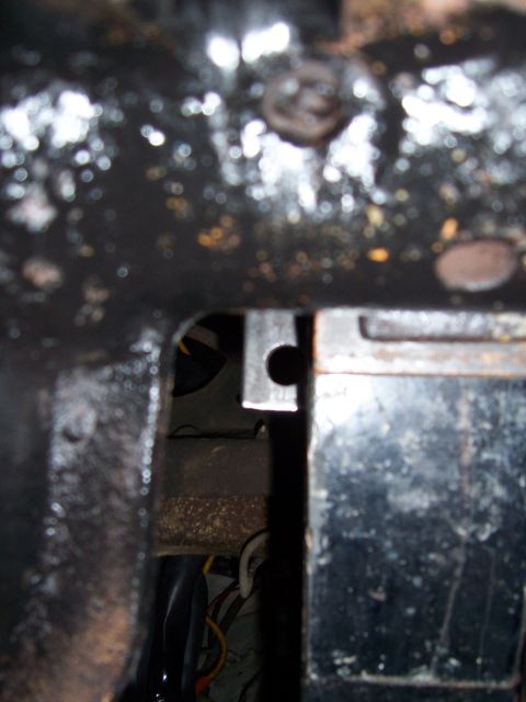 1983 Ford Bronco - Detail shot of metal brackets and wiring, not identifiable as a specific vehicle.