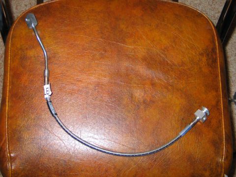 1994 Ford Bronco - Here's the left hose. Note the funky block on the end.