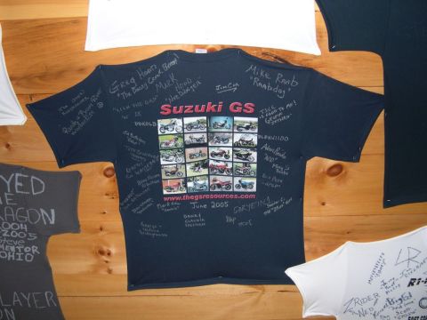 1985 Ford LTD Crown Victoria - A dark t-shirt displays images of Suzuki GS motorcycles and is covered in handwritten signatures and messages from June 2005.