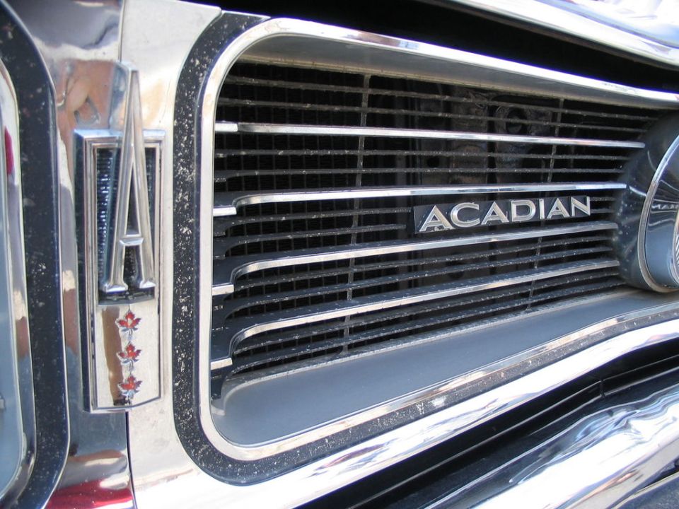 Front grille with ACADIAN badge and maple leaf emblem